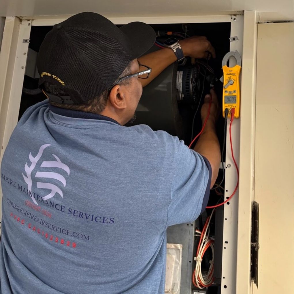 Empire Air Service technician performing air conditioning repair in Brevard County Florida